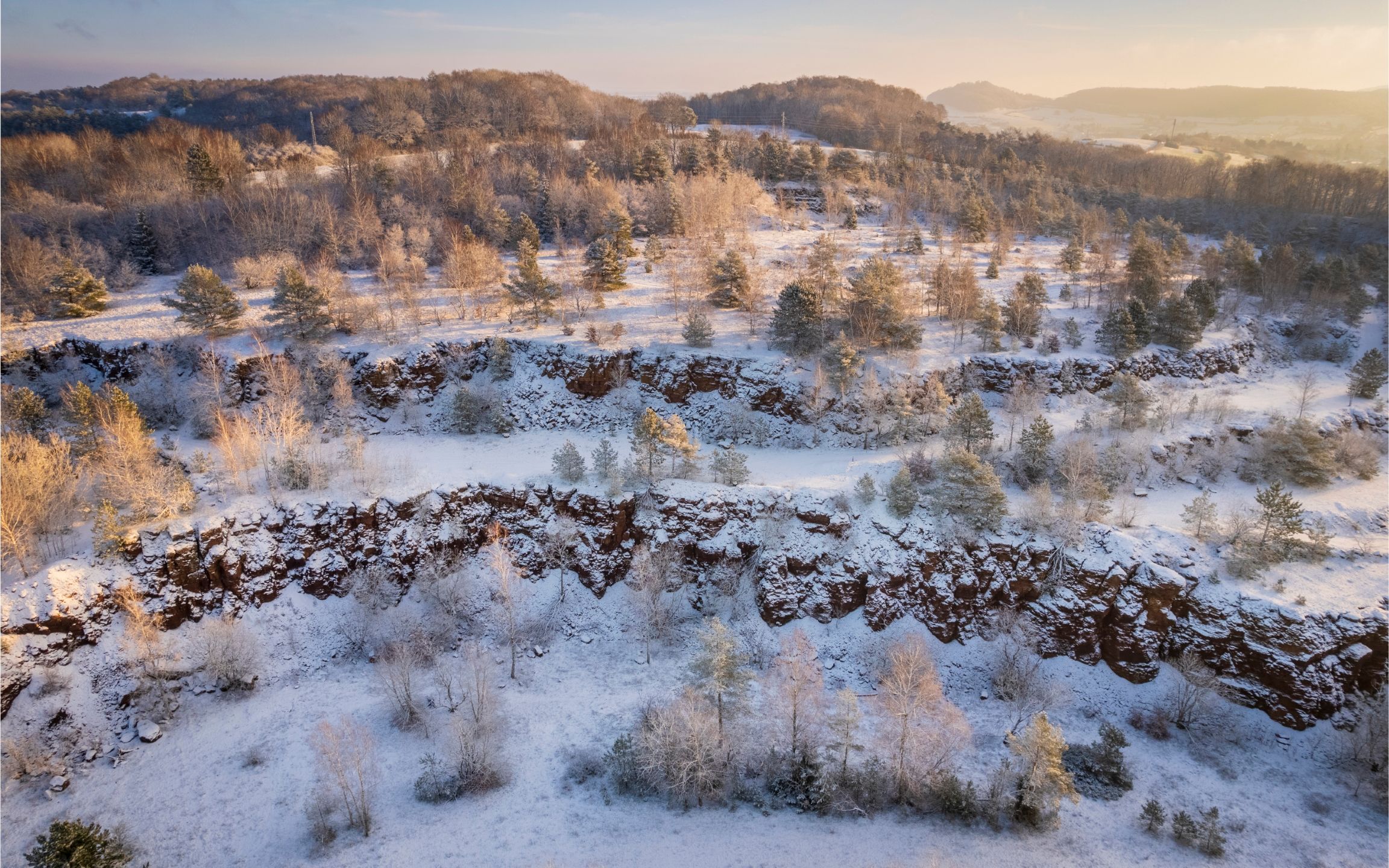 An aerial view of the Lalléngerbierg nature reserve during winter